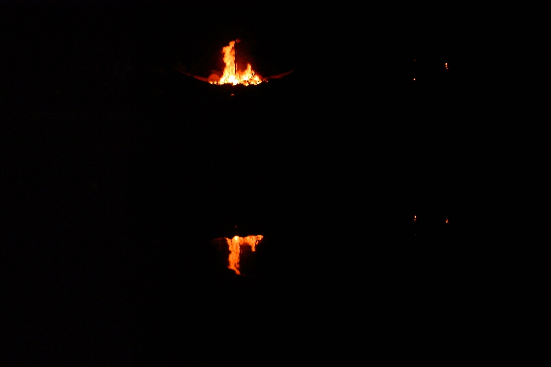 Amlwch 2004 (Gorm) burning boat reflection 2.jpg